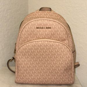 Michael Korns Monogrammed backpack.